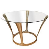 Aluminum pedestal table with round glass top by Boris Tabakoff