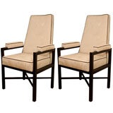Pair of ebonized wood high back arm chairs by Harvey Probber