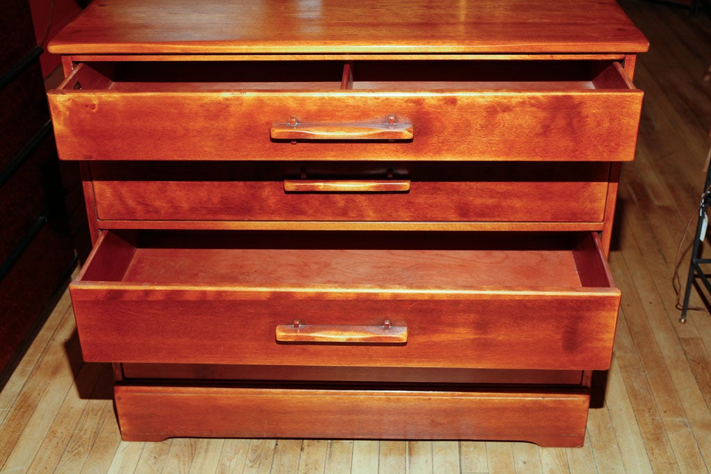Four drawer chest, by Cushman, with warm, Maple finish.  Simple clean lined design, with modern sensibility, and traditional detailing.  Solid maple, with excellent craftmanship.