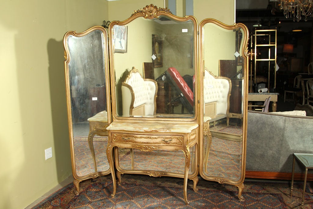 Fabulously Elegant Stamped Jansen Tri-Fold Mirrored Screen with dressing table attached, topped with a great piece of onyx. All with gilt high lights.