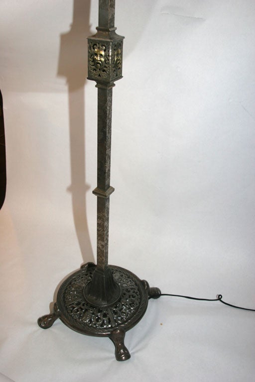 An Oscar B Bach Patinated Iron and Brass Floor Lamp 1
