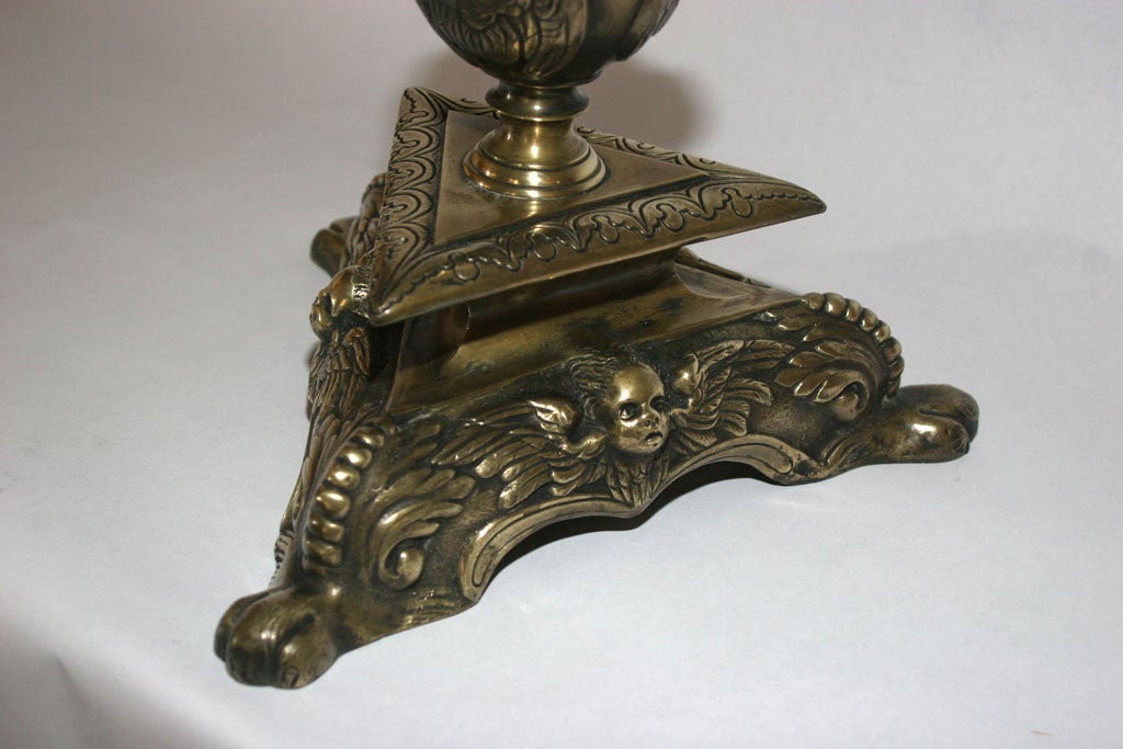 A pair of bronze table lamps attributed to Caldwell.