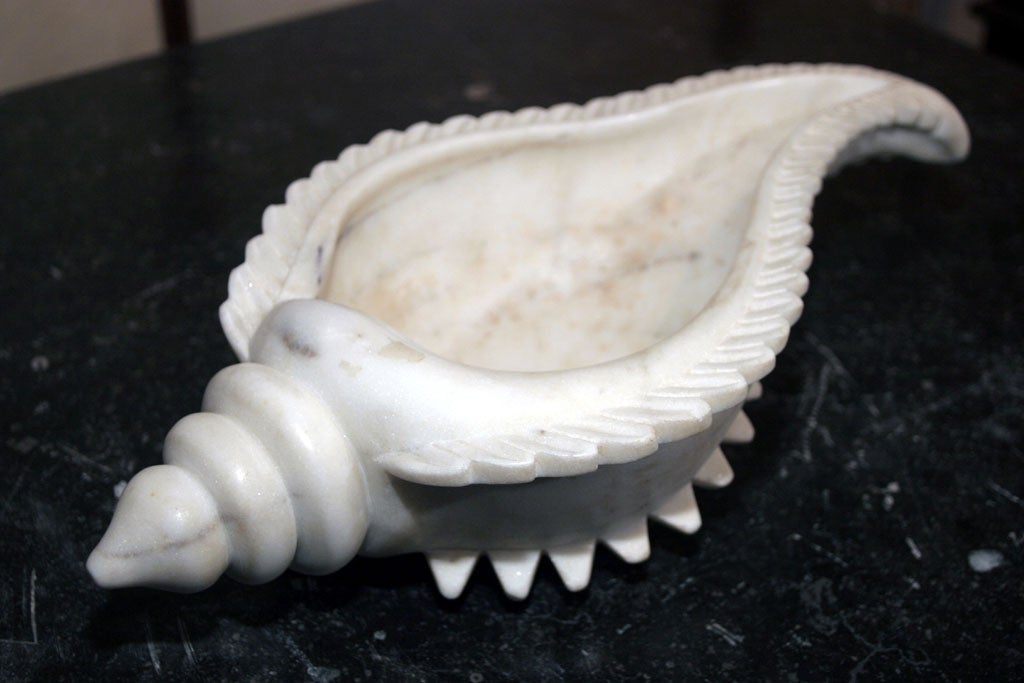 White marble conch shell bowl.