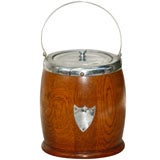 A English oak and silver-plate biscuit  barrel