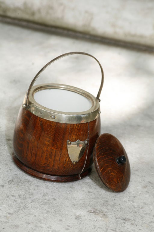 19th Century A English oak and silver-plate biscuit  barrel
