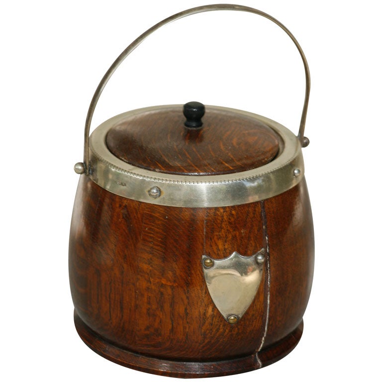 A English oak and silver-plate biscuit  barrel