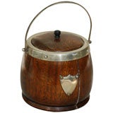 Antique A English oak and silver-plate biscuit  barrel