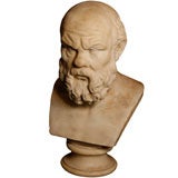 A white marble bust of Socrates