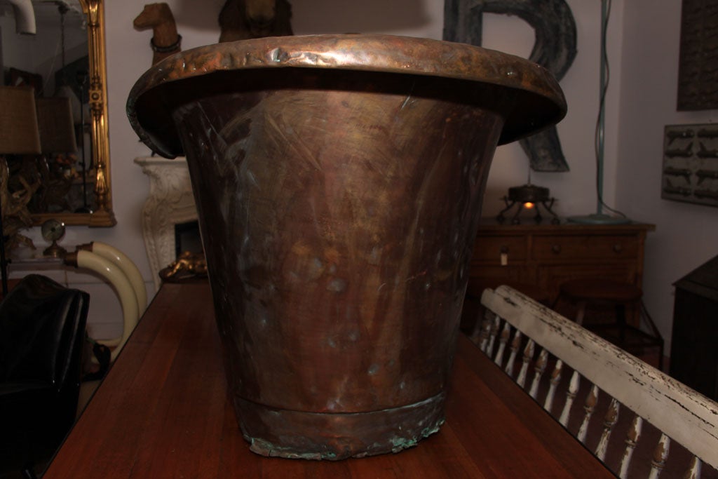 Vintage Rolled-Edge Copper Bathtub 1