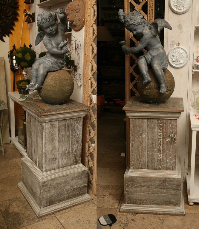 Pair of Winged Garden Putti