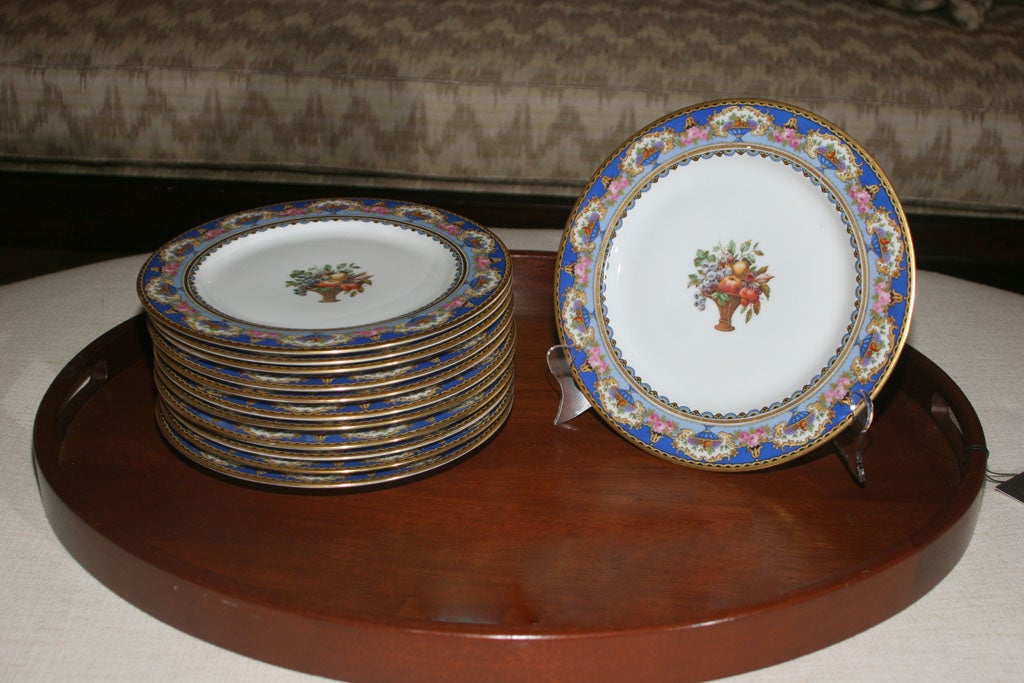 Checoslovakian hand painted gilded porcelain dinner plates.