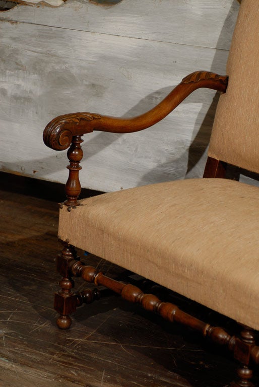A French Baroque style settee, with cross and side stretchers, turned legs, early 20th century.