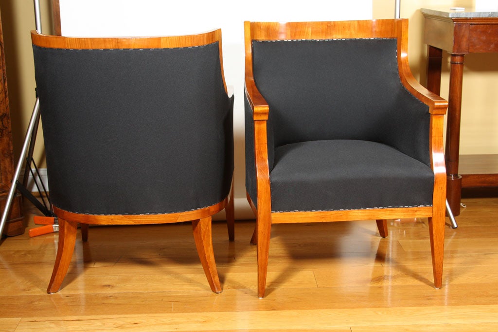 sleek and minimilistic best describes these elegant and refined early Austrian Biedermeier barrel back chairs in a solid cherry wood - generously sized and comfortable