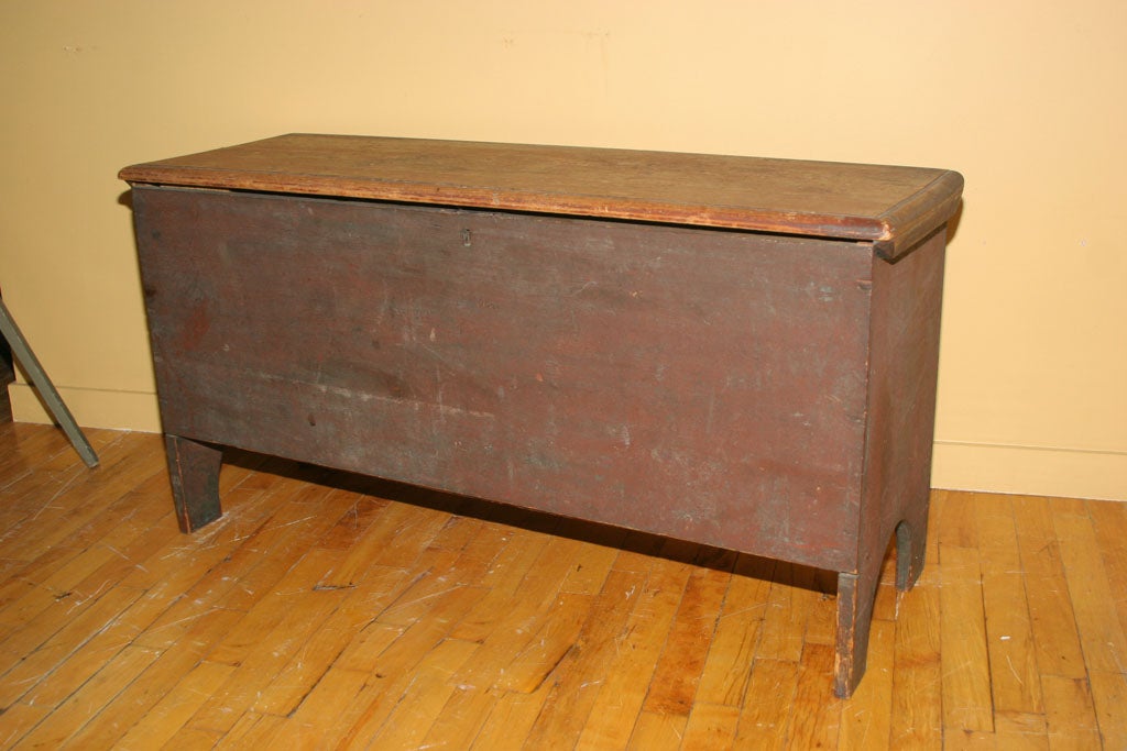 Fine American six-board blanket chest in beautiful, dry green paint over original red.  Molded top.  High half-moon bootjack ends.  Original snipe hinges.  New England origin, circa 1790.