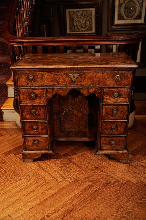 A George I Burl Walnut Kneehole Desk