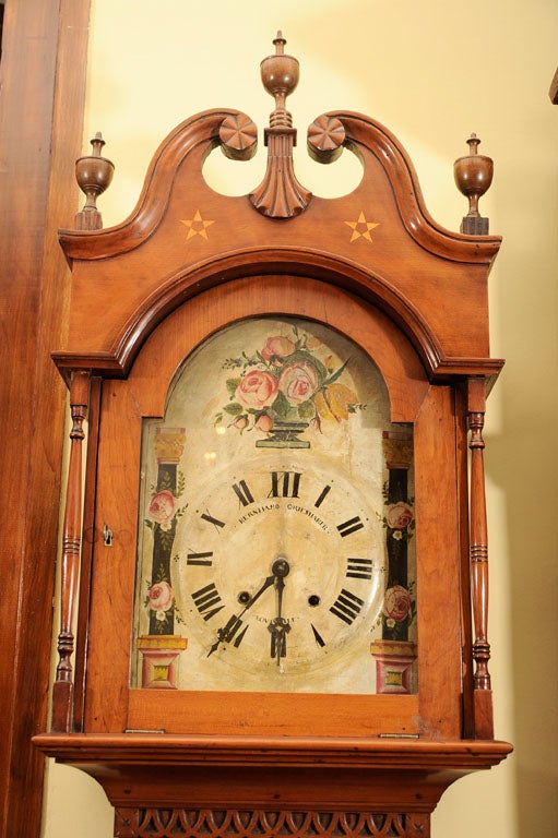 An Important Kentucky Federal Inlaid Cherrywood Tallcase Clock, the works signed Bernhard Grieshaber, Louisville, early 19th century<br />
the broken-arch pediment inlaid with a star centering a shell-carved plinth and finials, the fall-front