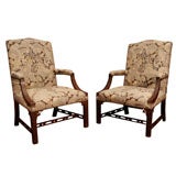 A Pair of English Carved Mahogany Library Armchairs
