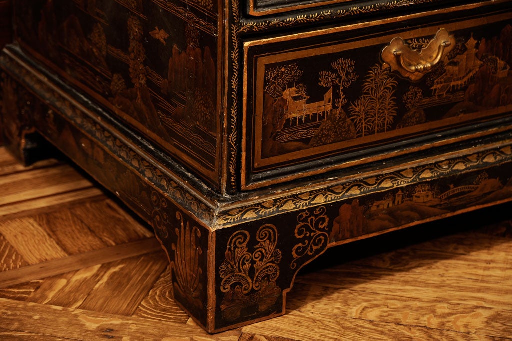 A CHINESE EXPORT BLACK AND GILT LACQUER AND MOTHER-OF-PEARL INLAID BUREAU FROM THE DANISH ROYAL COLLECTIONS<br />
CIRCA 1740 <br />
<br />
The hinged slant-front enclosing drawers and pigeonholes, over two short and two long drawers with nashiji
