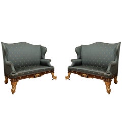 An Unusual Pair of Rosewood and Gilt-Brass Sofas