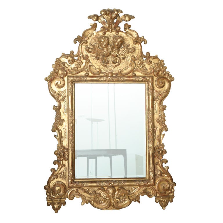 Fine and Monumental Italian Baroque Giltwood Mirror For Sale