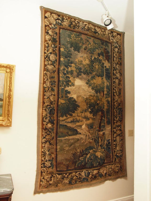 17TH CENTURY BRUSSELS TAPESTRY with egret in pastoral scene with original border. Exceptional size