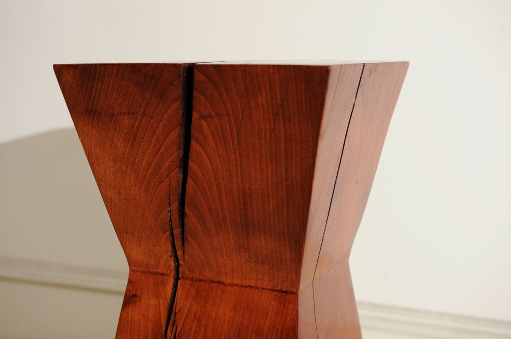 Occassional table carved from a solid piece of cherrywood by contemporary wood artist, John Struble. The natural markings of the wood enhance its warmth and appeal.