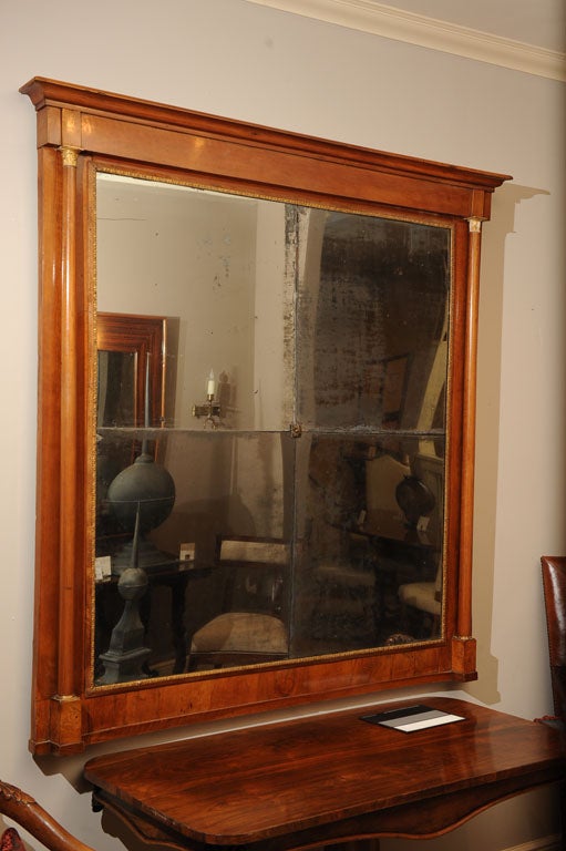 Late 18th Century Italian Neoclassical Walnut and Parcel Gilt Mirror