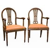 A pair of Italian Arm Chairs