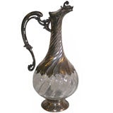 A SILVER AND GLASS CLARET JUG. FRENCH, CIRCA 1900
