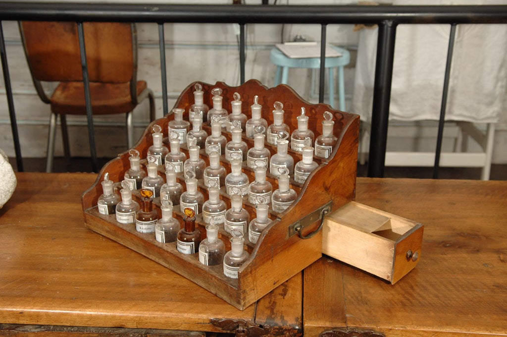 Wood French Apothecary Cabinet with Small Pharmacy Bottles