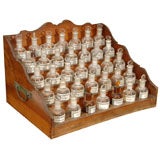 Used French Apothecary Cabinet with Small Pharmacy Bottles