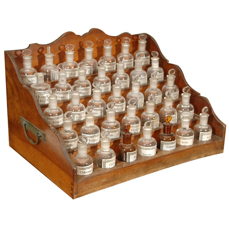 French Apothecary Cabinet with Small Pharmacy Bottles at ...