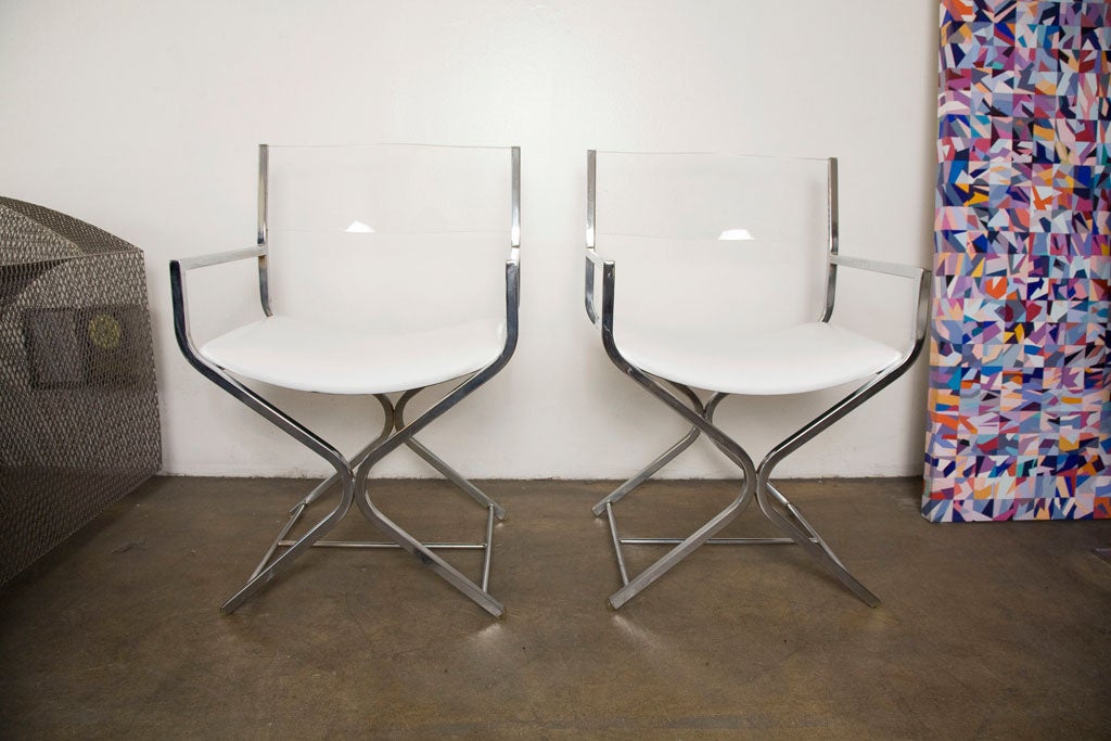 Pair of Lucite and chrome directors chairs. 6