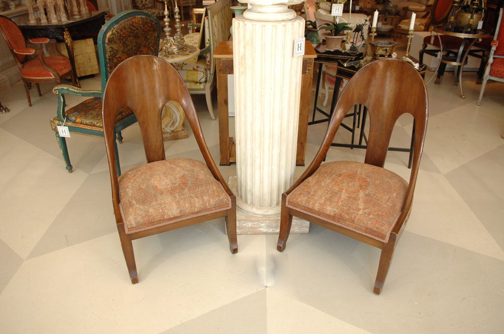 Pair of Rare 19th Century Italian Walnut Spoon-back Side Chairs,<br />
upholstered in Fortuny fabric