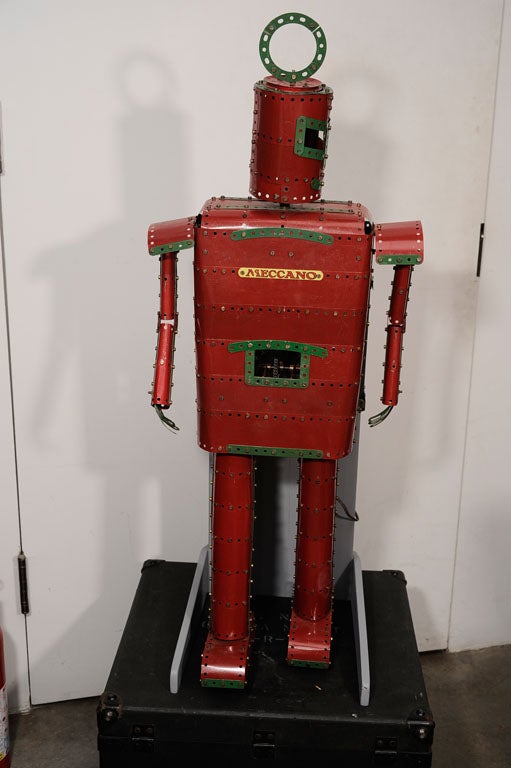 Cool, mechanical robot trade sign by Meccano. The head spins and the arms move back and forth when plugged in.