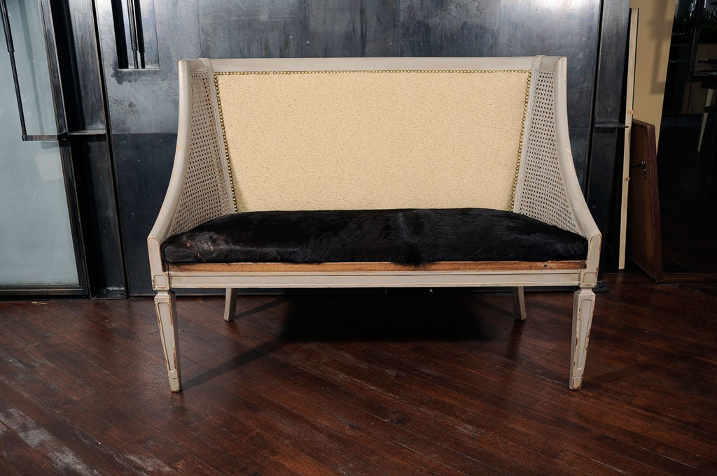 Vintage Belgium Cowhide Caned Settee with Pillows In Excellent Condition In New Rochelle, NY