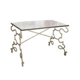A Wrought Iron Table with Faux Marble Painted Decoration