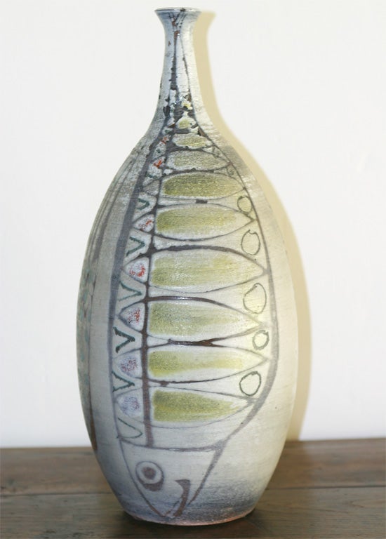 Sculptural ceramic with fish patterns that run all along the shape.

Signed under the base.

For any further information, pictures, shipping quotes, do not hesitate to contact us prior purchasing by clicking on "Contact Dealer" button.