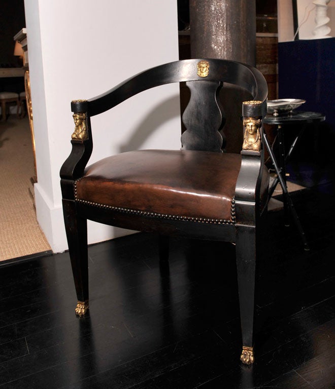 19th century French ebonized leather desk chair.