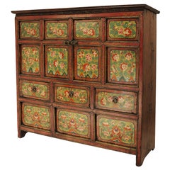 VERY NARROW TIBETAN CABINET