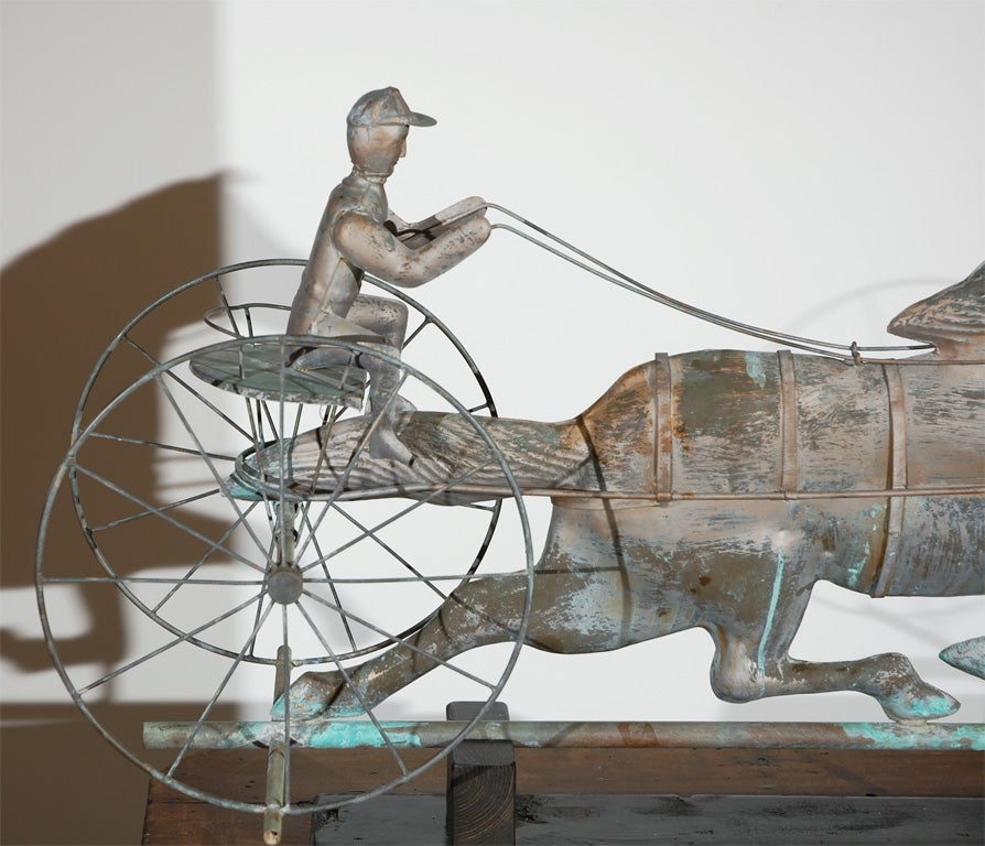 WONDERFUL FOR AND SURFACE 20THC ORIGINAL SILVER ROOF PAINT OVER COPPER W/ZINK HEAD ON RIDE WEATHE VANE.FOLKY VANE IS A WONDERFUL EXAMPLE OF A FOM OF THE 19THC SAME FORM FOR MUCH LES MONEY.THIS HORSE & RIDER SITS ON A CAST IRON MOUNT AND IS IN GREAT