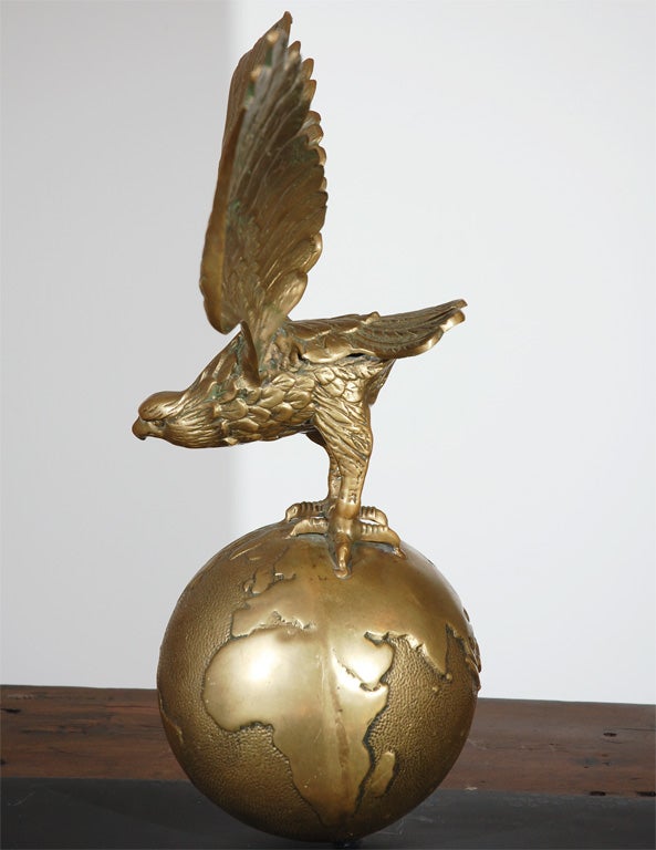 globe with eagle on top