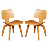 Pr. of Eames DCW chairs in   Birch with  early Evans label
