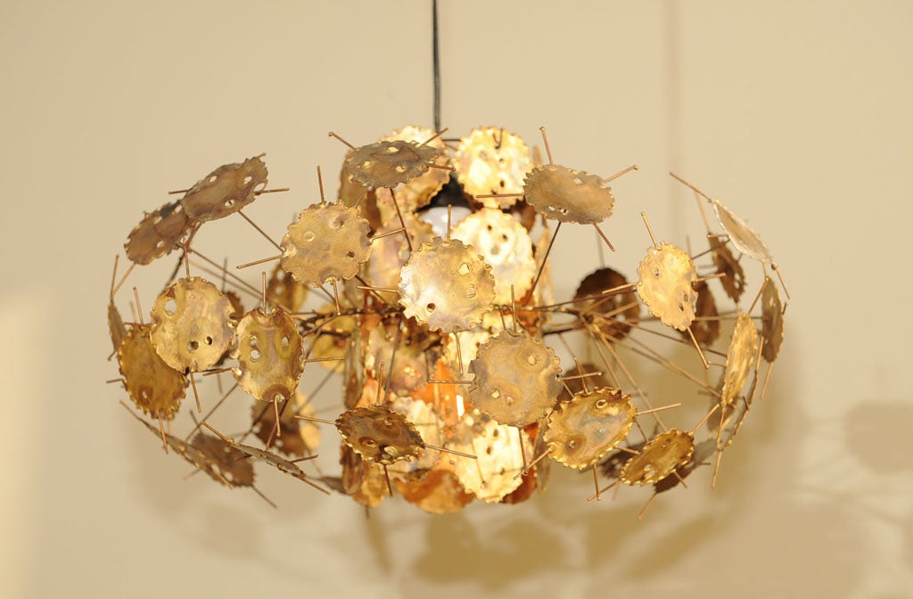 Single light brass fixture on new cord.