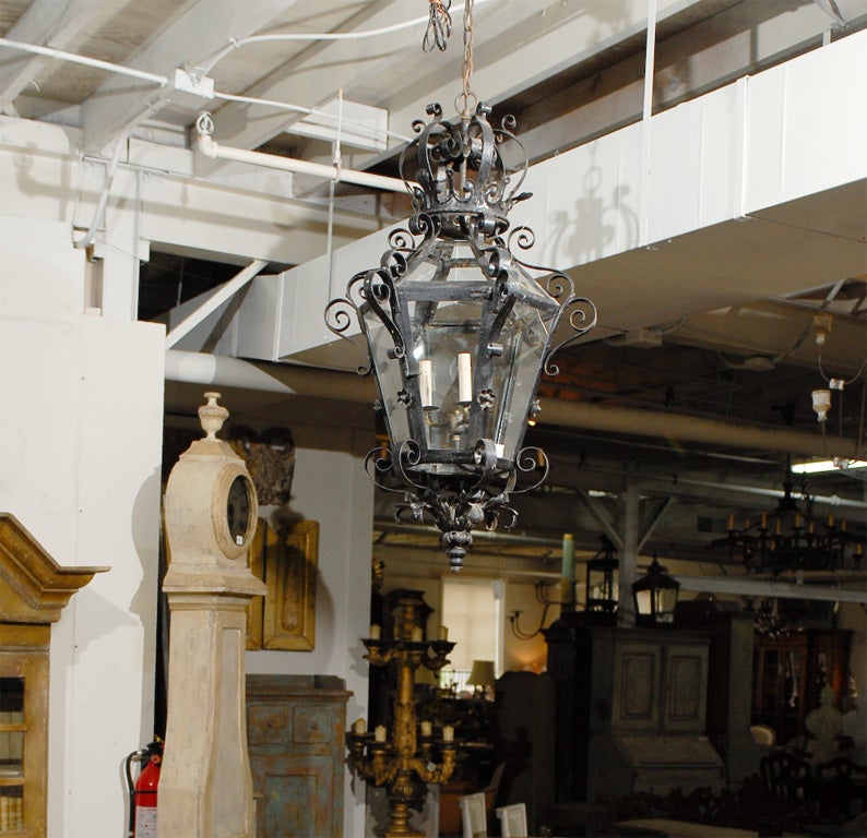 Mid-Century Modern An Exquisite French Large-Sized Scrolling Forged Iron 3-Light Lantern, c. 1950 For Sale