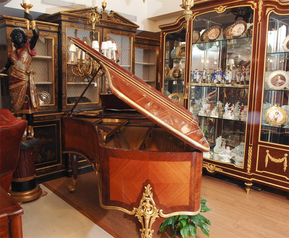 19th c Signed F Linke kingwwod and bronze dore 3 legged piano. The piano works by Erard. Beautiful bronze dore trim