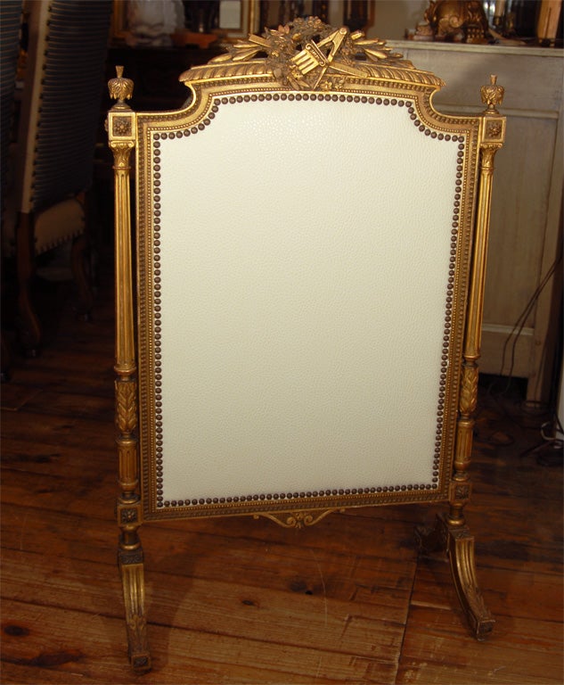 Louis XVI style gilded fireplace screen from France c. 1860