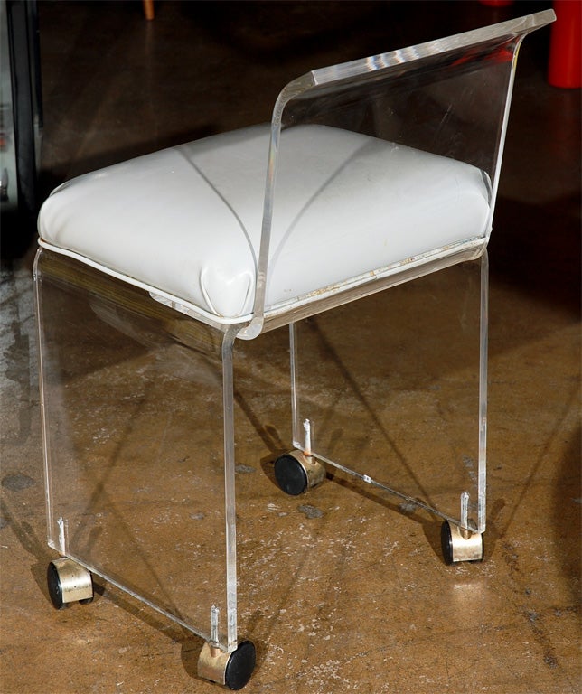 Lucite vanity chair with casters 1