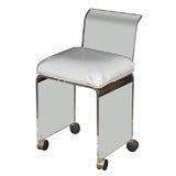 Lucite vanity chair with casters