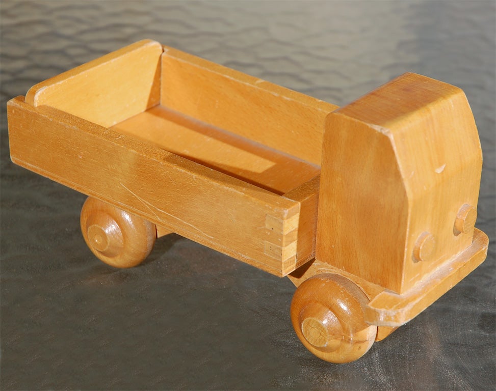 This a rare toy track by the early apprentice of Georg Jensen and later important designer and maker of wooden toys, like tihis sample.